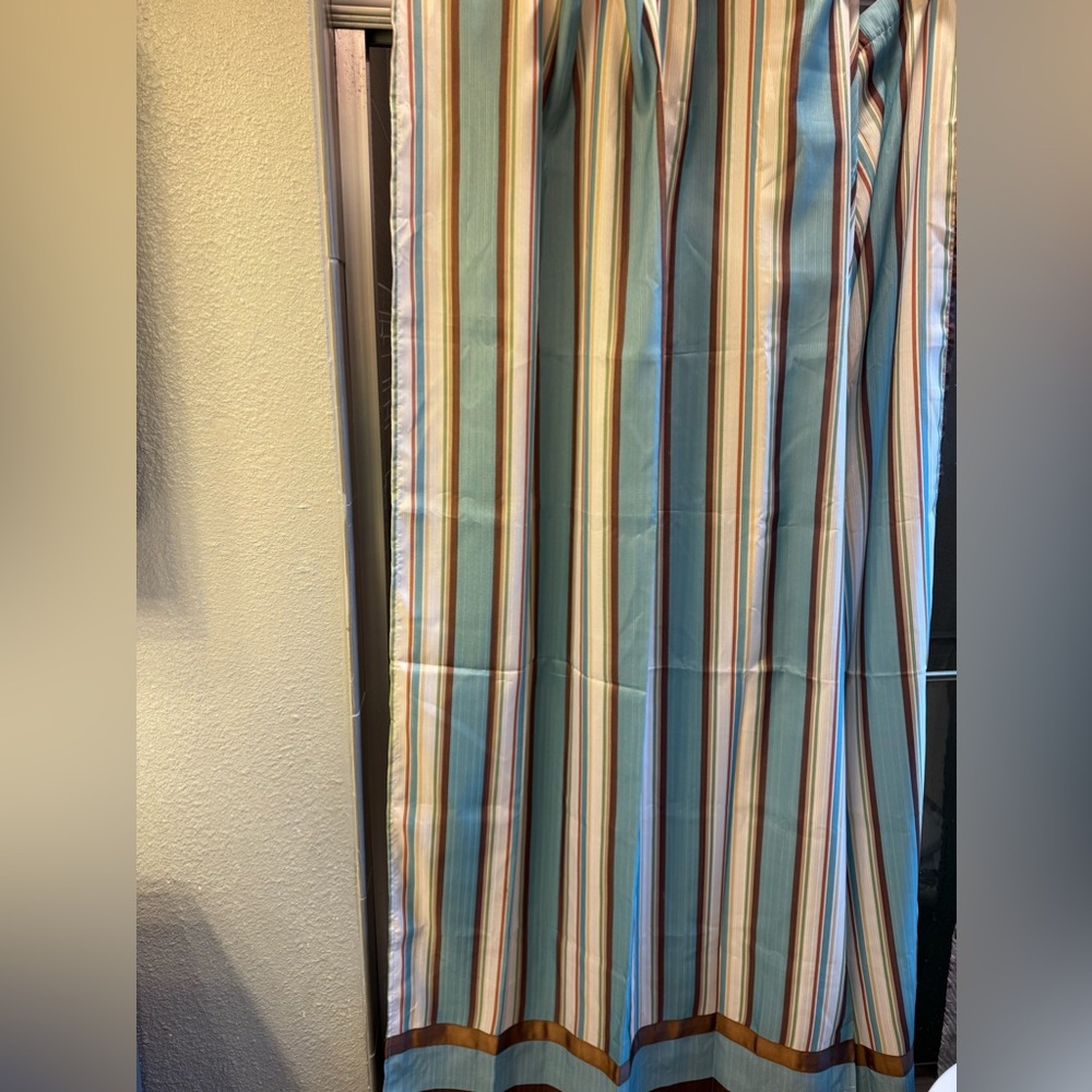 Striped fabric shower curtain with rings